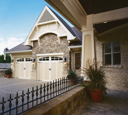 Clopay carriage house style garage doors on a brick home