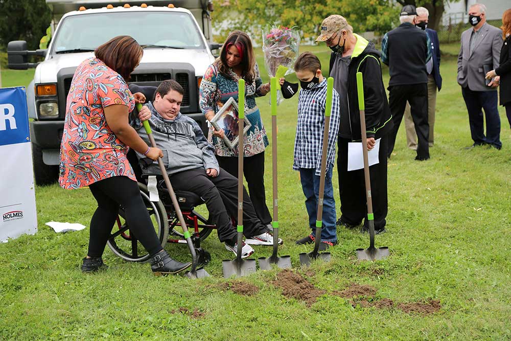 Marie's Son digging with shovel at Habitat Groundbreaking