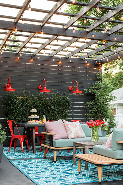 Urban Oasis 2018 home backyard couches and dining area